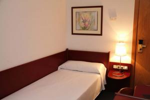 Hotel Prisma bedroom